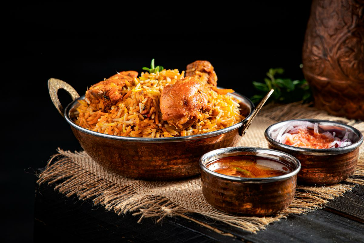 Hyderabadi Chicken Dum Biryani in copper handi